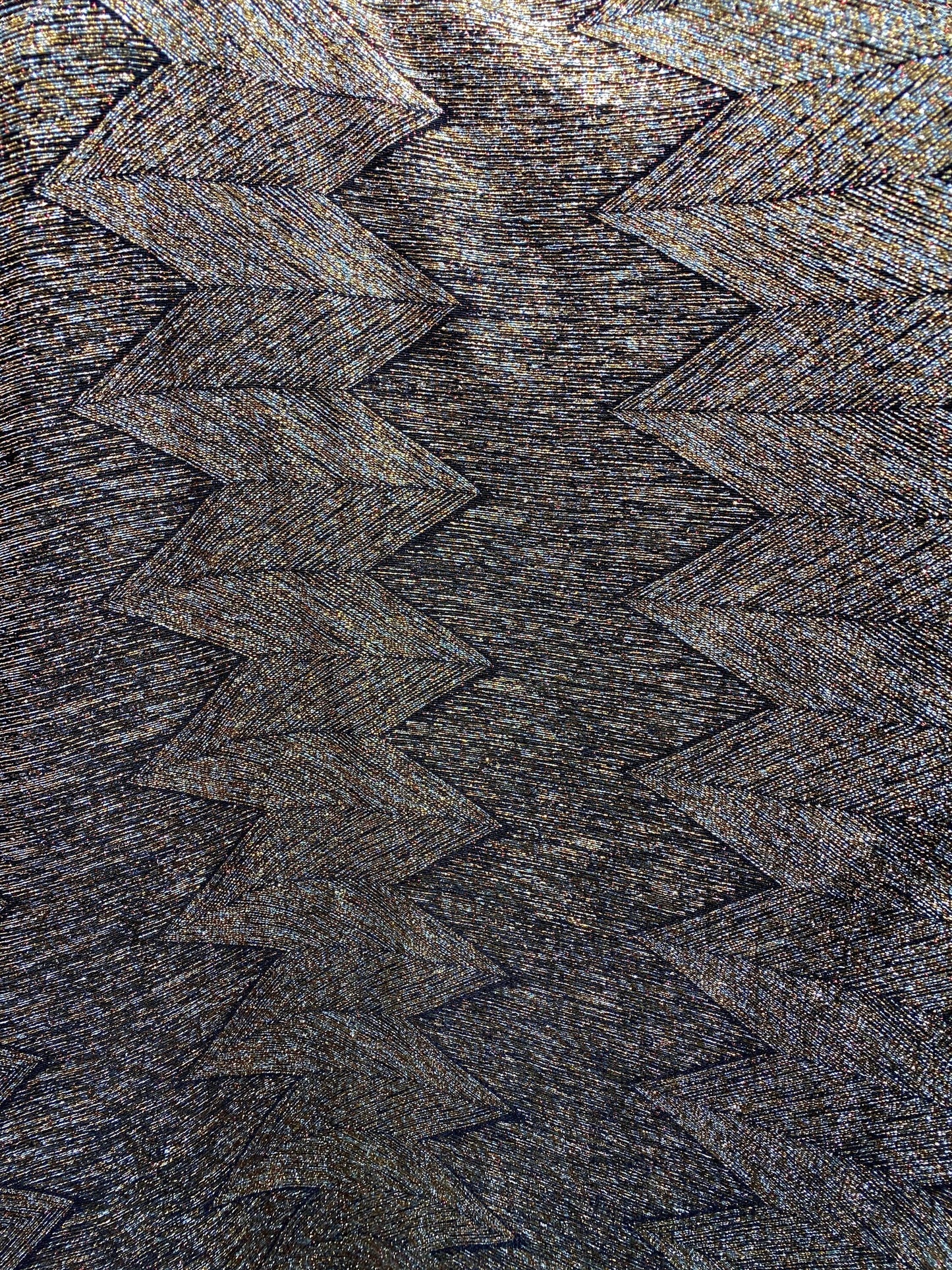 New geometric zigzag design metallic poly spandex bronze color medium weight 4-way stretch 58/60” Sold by the YD. Ships Worldwide from L.A