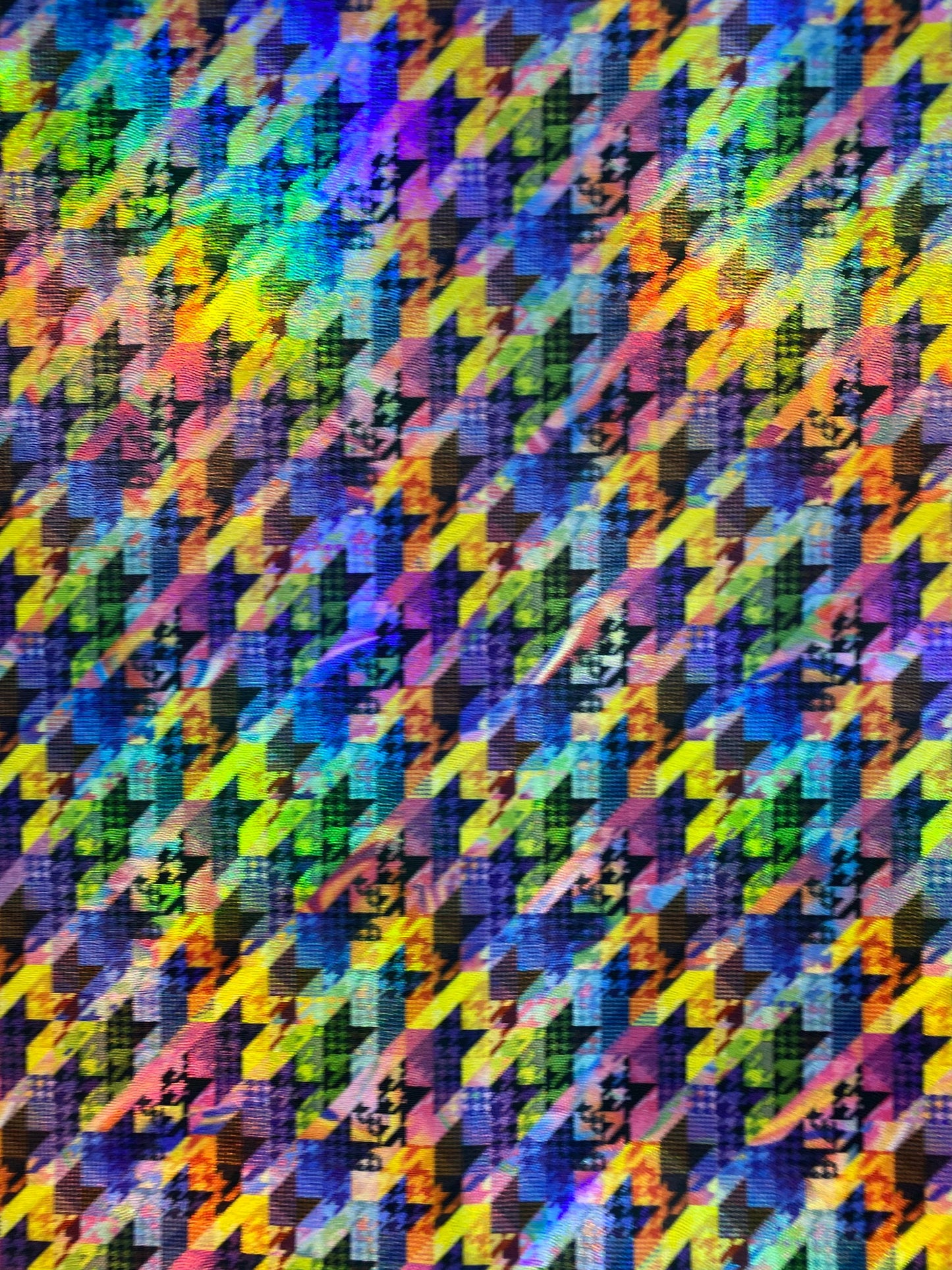 New modern houndstooth rainbow design digital foil print lacer hologram metallic nylon spandex 4-way stretch 58/60” Sold by the YD.