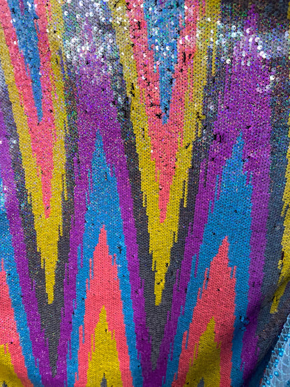 New chevron design multicolor rainbow sequins on stretch mesh 2-way 55/57” Sold by the YD. Ships worldwide from Los Angeles California USA.