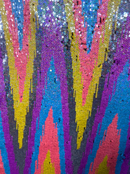 New chevron design multicolor rainbow sequins on stretch mesh 2-way 55/57” Sold by the YD. Ships worldwide from Los Angeles California USA.