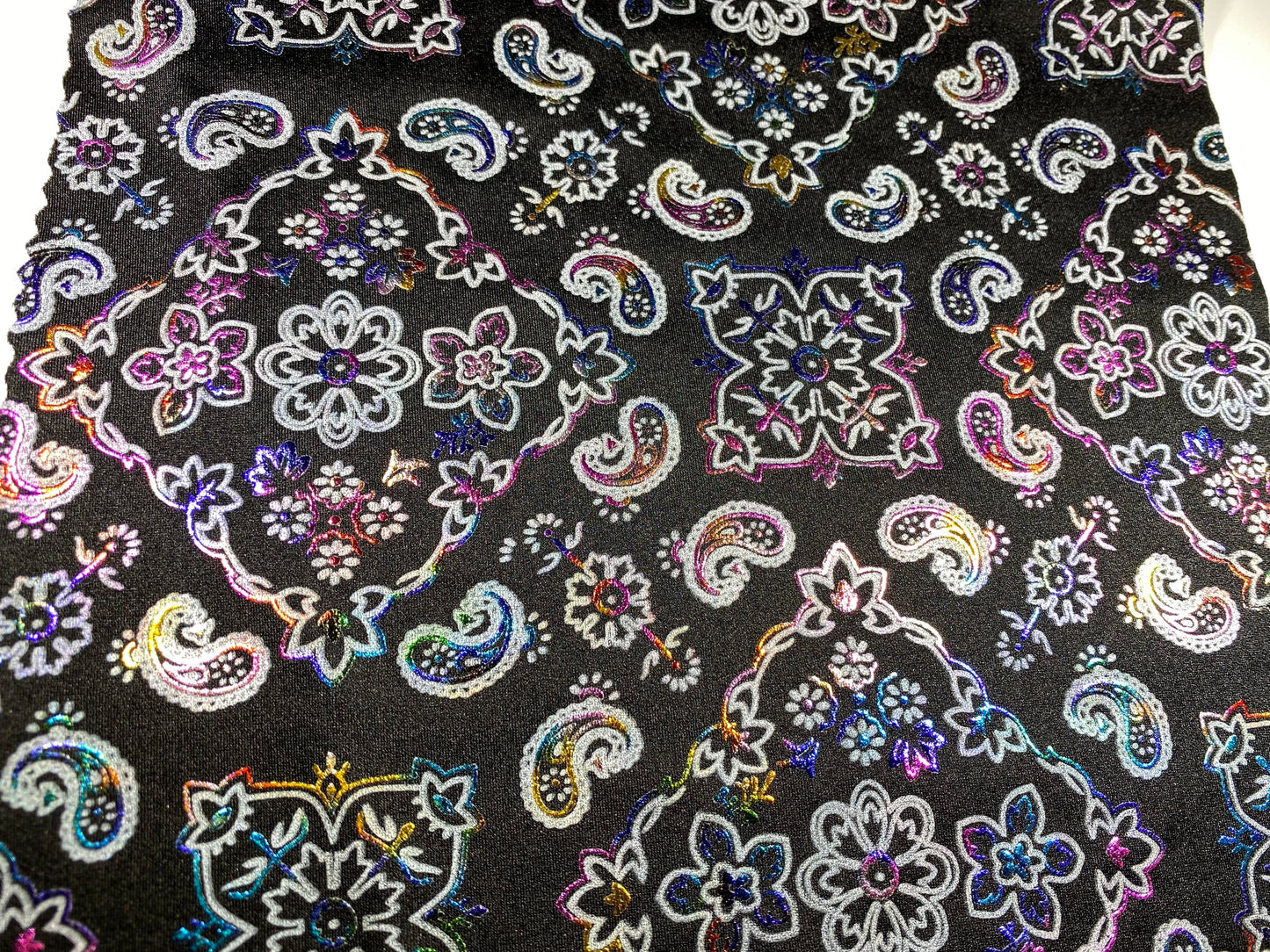 New Bandana paisley design black/rainbow metallic nylon spandex 4-way stretch 58/60” Sold by the YD. Ships Worldwide from Los Angeles cali