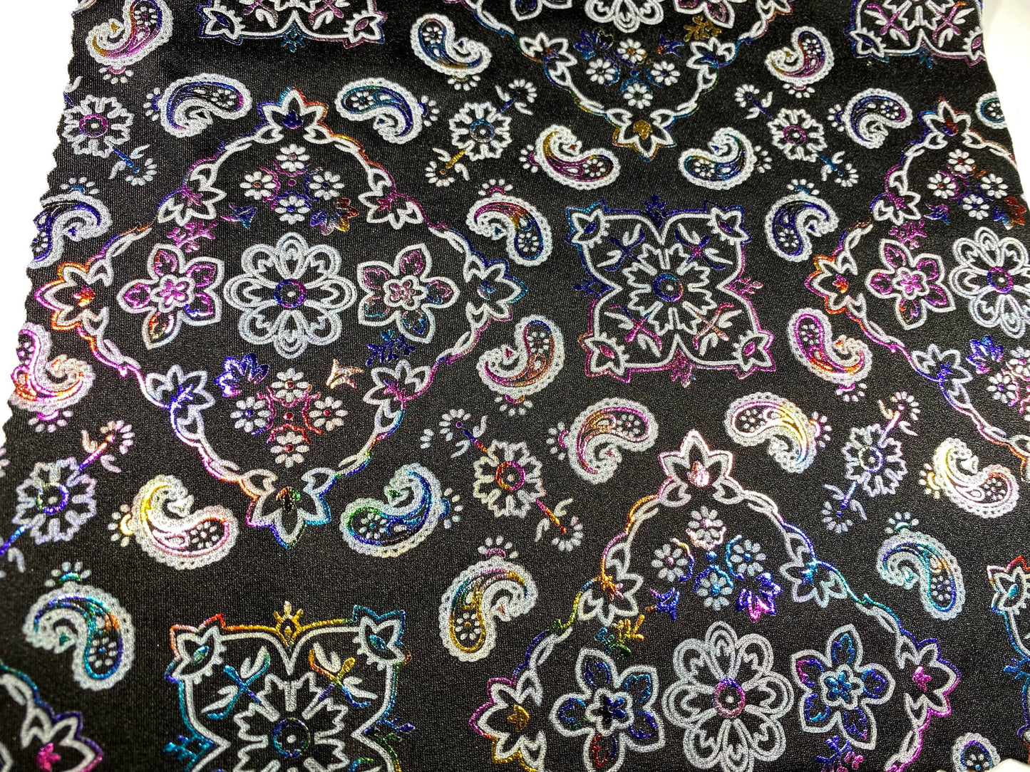New Bandana paisley design black/rainbow metallic nylon spandex 4-way stretch 58/60” Sold by the YD. Ships Worldwide from Los Angeles cali