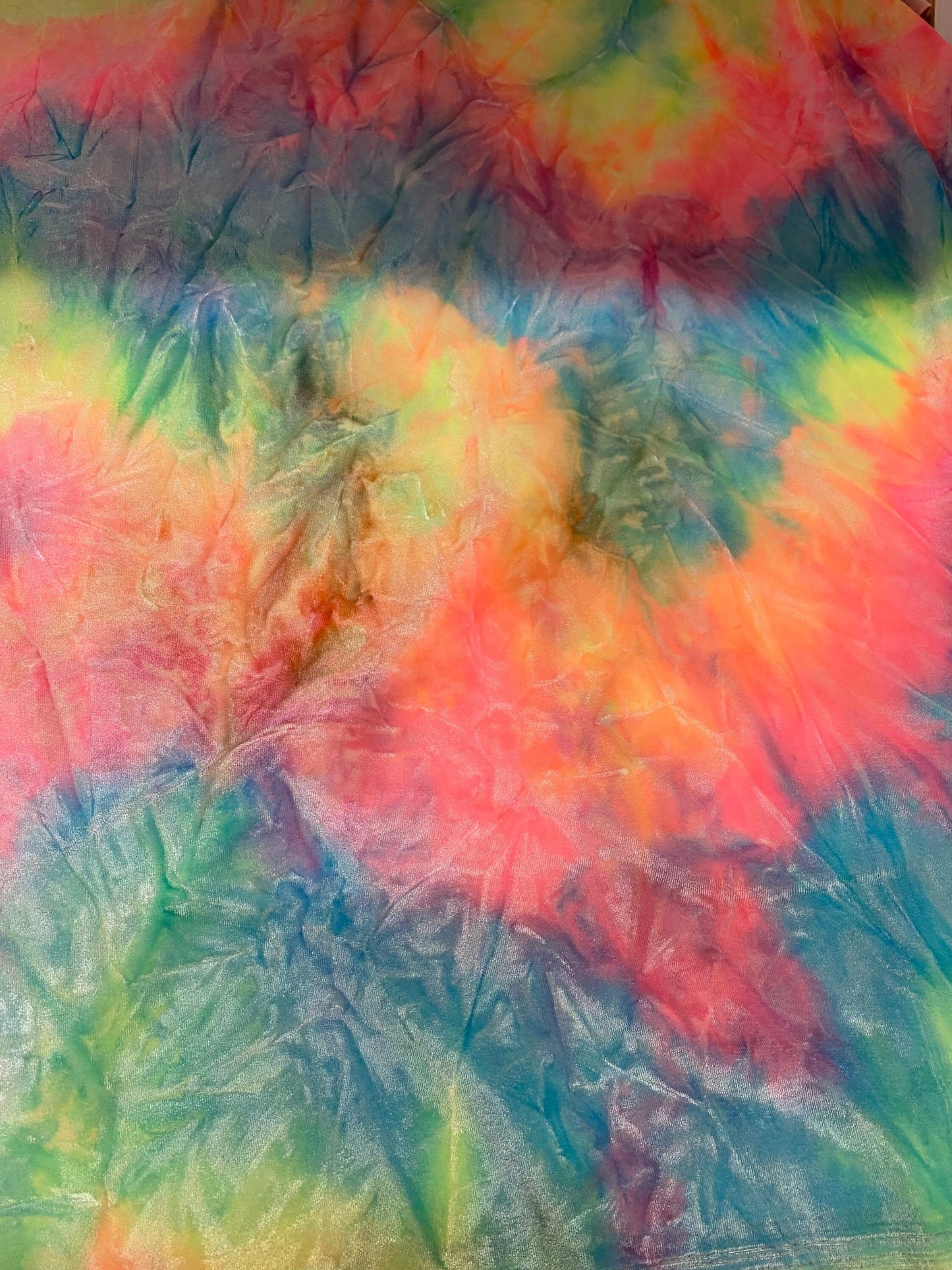 New tie dye stretch crushed velvet 4way Stretch multi pastel colors 58/60” Sold by the YD. Ships worldwide feom Los Angeles California USA.