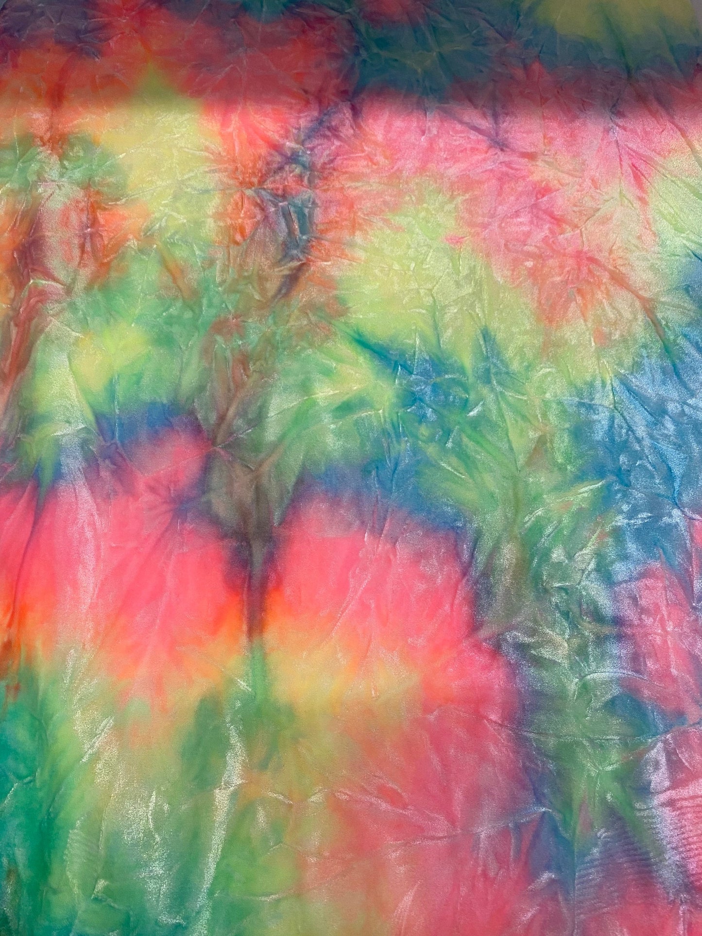 New tie dye stretch crushed velvet 4way Stretch multi pastel colors 58/60” Sold by the YD. Ships worldwide feom Los Angeles California USA.