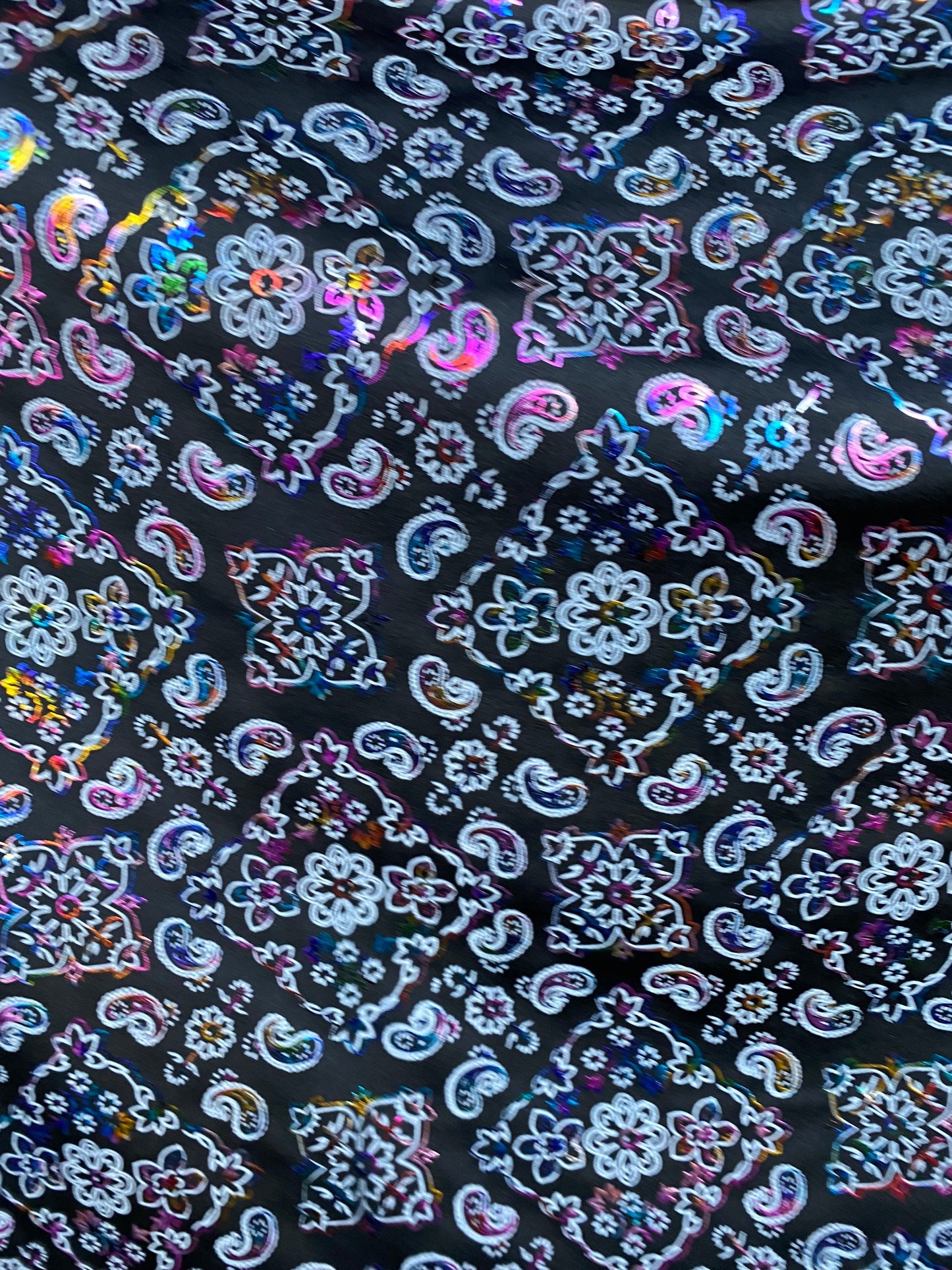 Bandana paisley design black/rainbow print on nylon spandex with foil 4-way stretch 58/60” Sold by the YD. Ships worldwide from Los Angeles