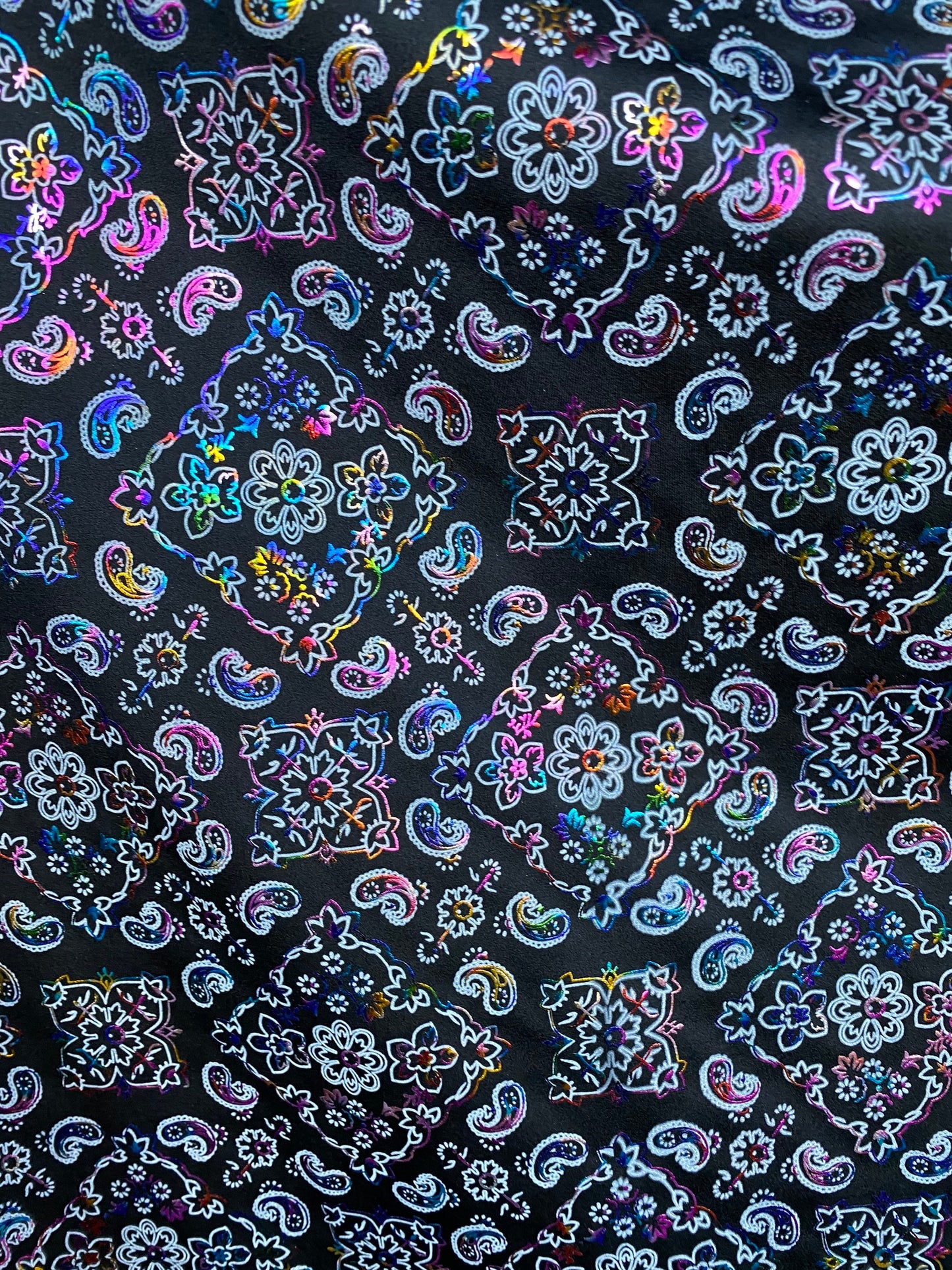 Bandana paisley design black/rainbow print on nylon spandex with foil 4-way stretch 58/60” Sold by the YD. Ships worldwide from Los Angeles