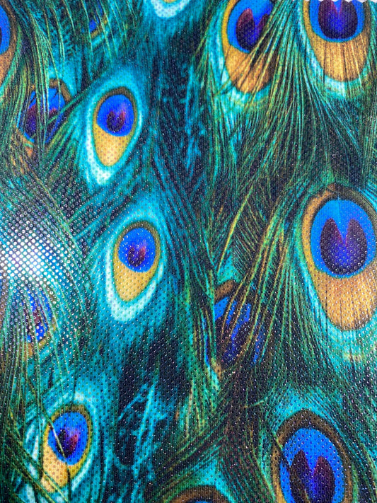 New peacock design reaction print on great quality of nylon spandex with clear foil dots 4-way stretch 58/60” Sold by the YD.