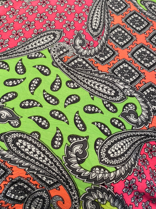 New paisley designs neon colors print on poly spandex jersey 4-way stretch medium weight 58/60” Sold by the YD. Ships Worldwide from L.A CA.