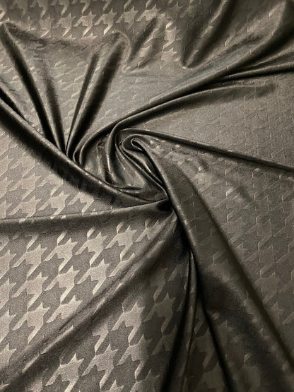 Houndstooth jumbo embossed great quality of nylon spandex 4-way stretch 58/60” Sold by the YD. Ships worldwide from Los Angeles California