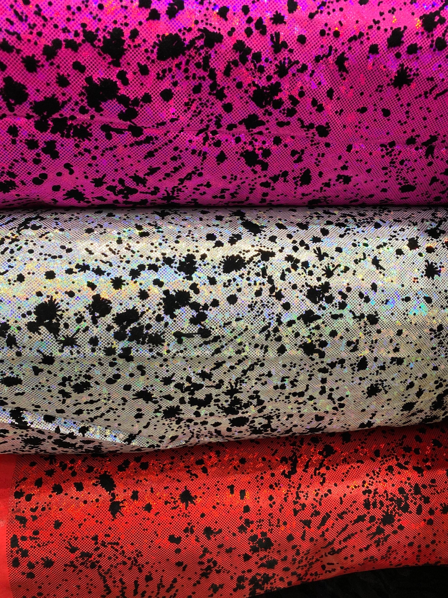 New splatter paint design print with flocking in hologram shattered glass metallic nylon spandex 4-way stretch 58/60” Sold by the YD.