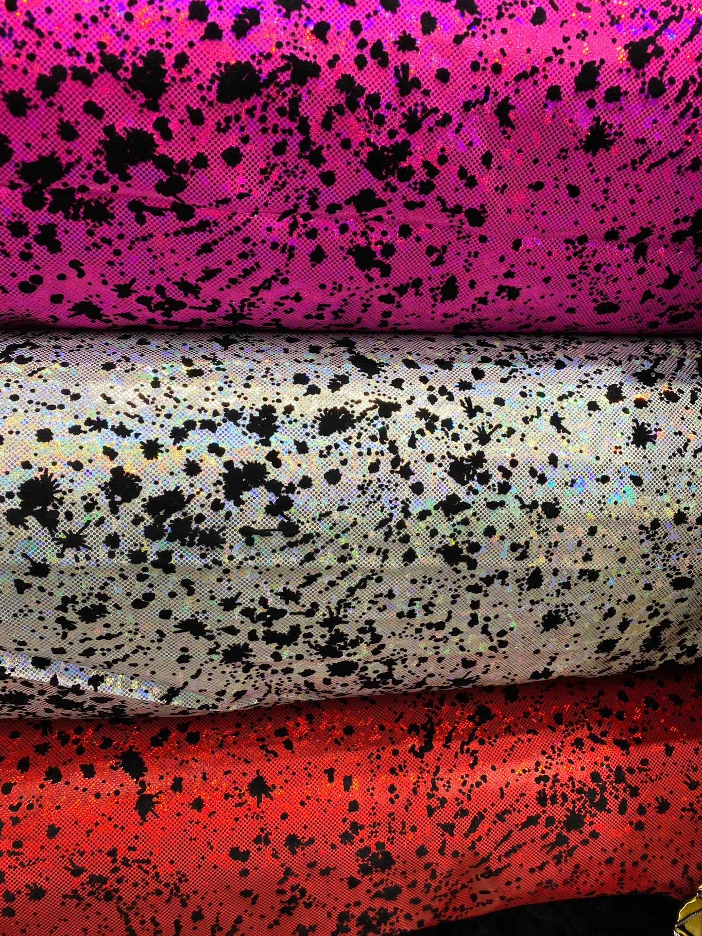 New splatter paint design print with flocking in hologram shattered glass metallic nylon spandex 4-way stretch 58/60” Sold by the YD.