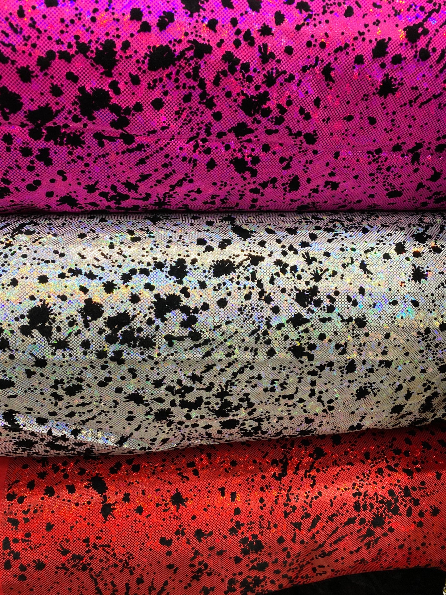 New splatter paint design print with flocking in hologram shattered glass metallic nylon spandex 4-way stretch 58/60” Sold by the YD.