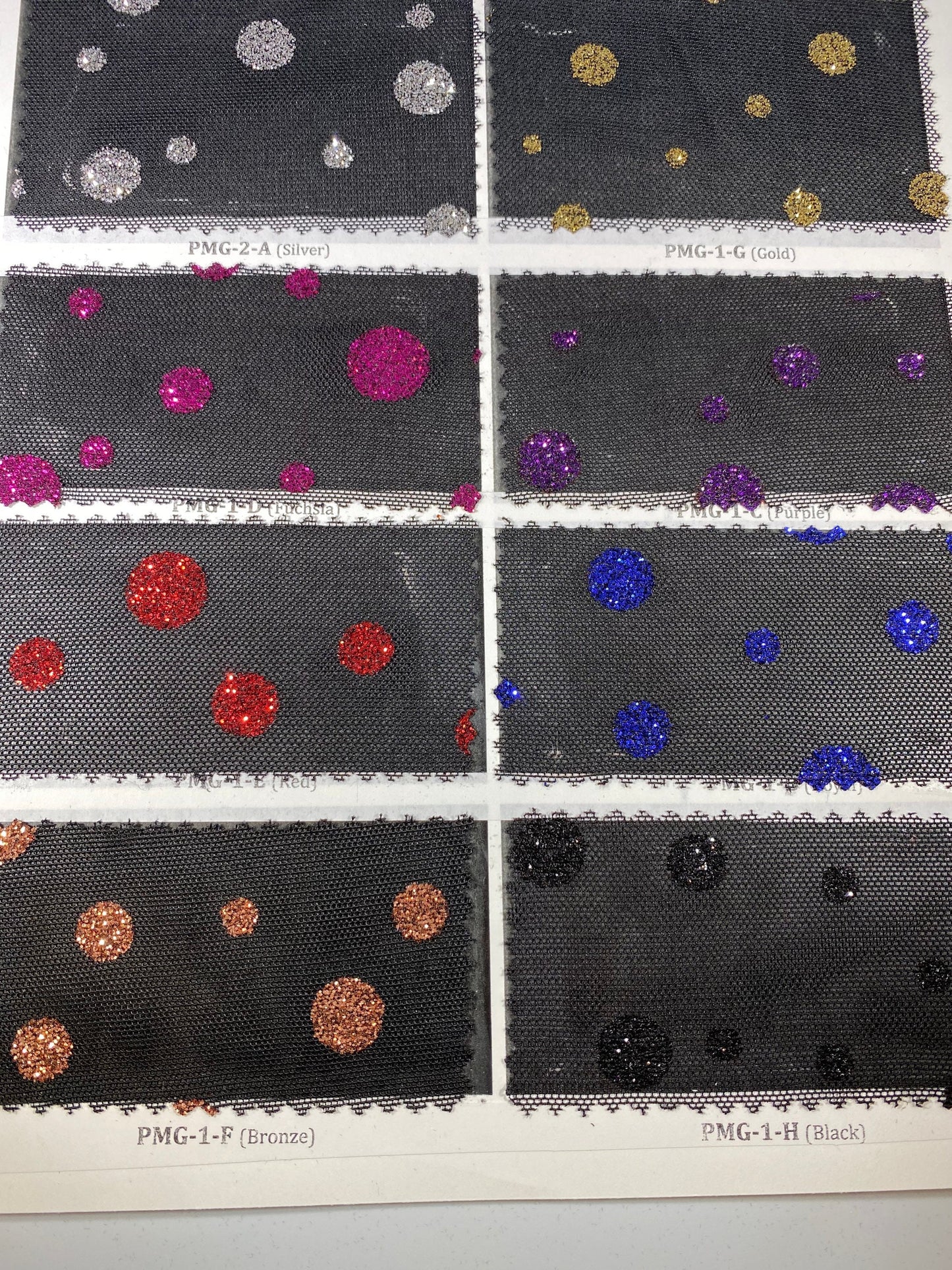 New Glitter polka dots design on black power mesh 2-way stretch 58/60” Sold by the YD. Ships Worldwide from Los Angeles California USA.