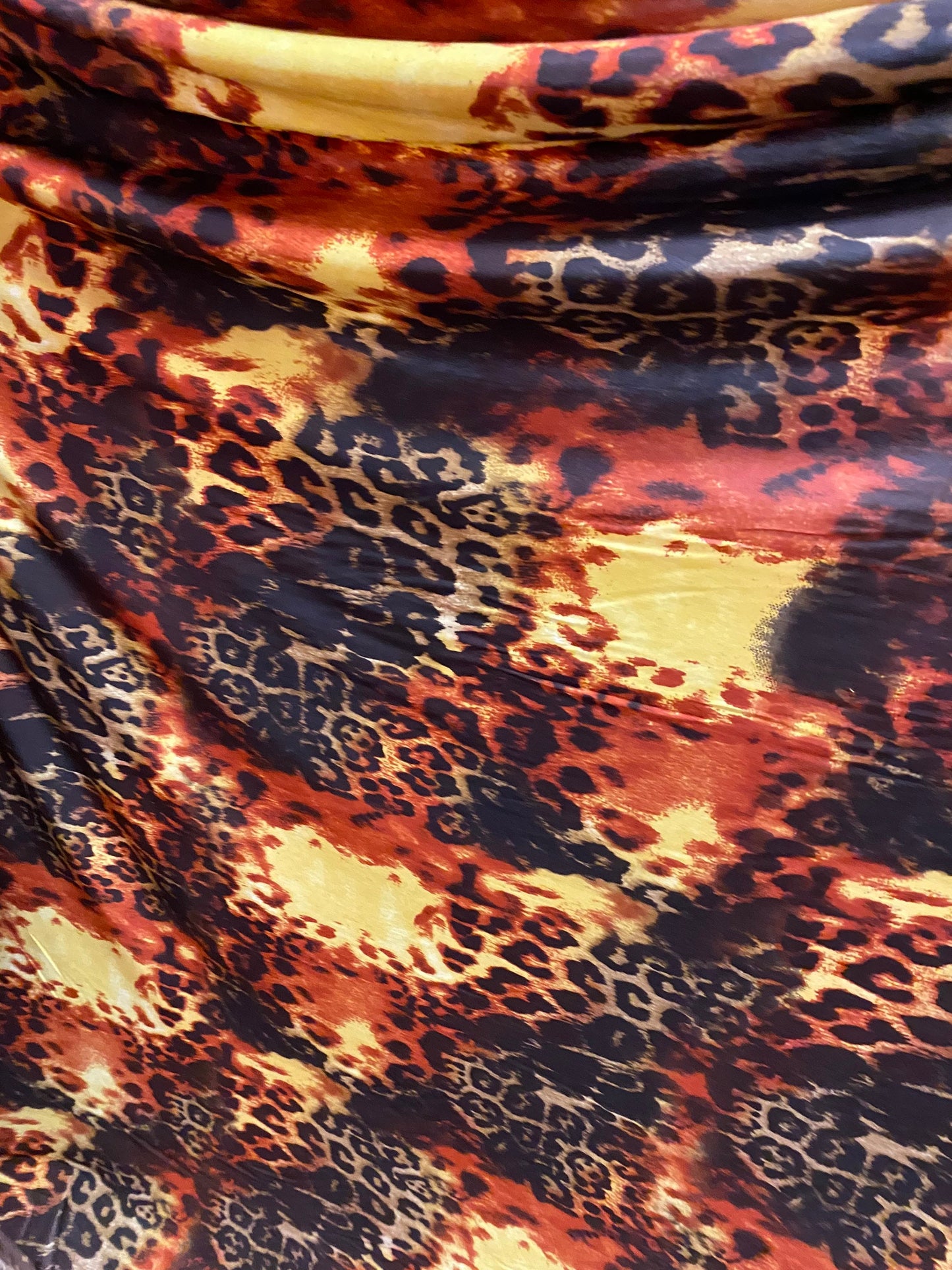 New exotic leopard Animal patch design print on poly spandex medium weight 4-way stretch 58/60” Sold by the YD. Ships Worldwide from LA CA.
