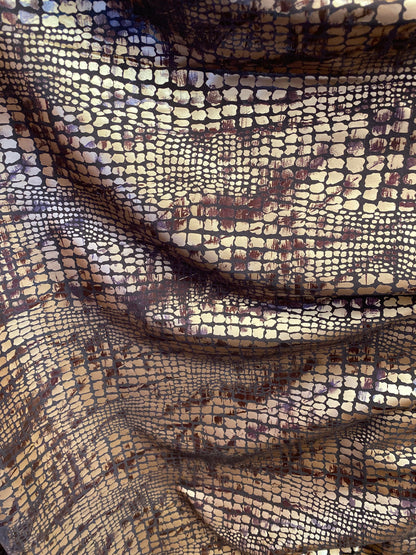 New Exotic animal print on metallic polyester non stretch 58/60” Sold by the YD. Ships Worldwide from Los Angeles California USA.