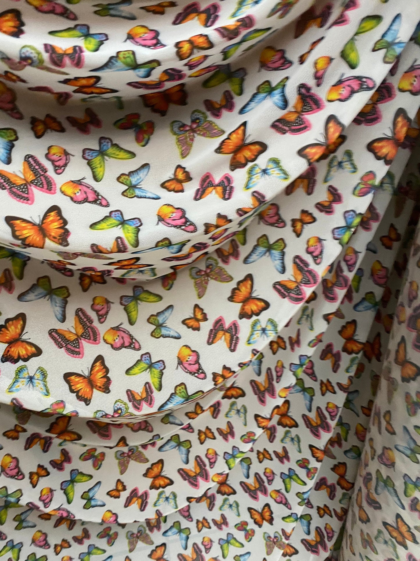 New butterflies design multicolor print on good quality stretch power mesh 4-way stretch 58/60” Sold by the YD. Ships worldwide from Los Ang