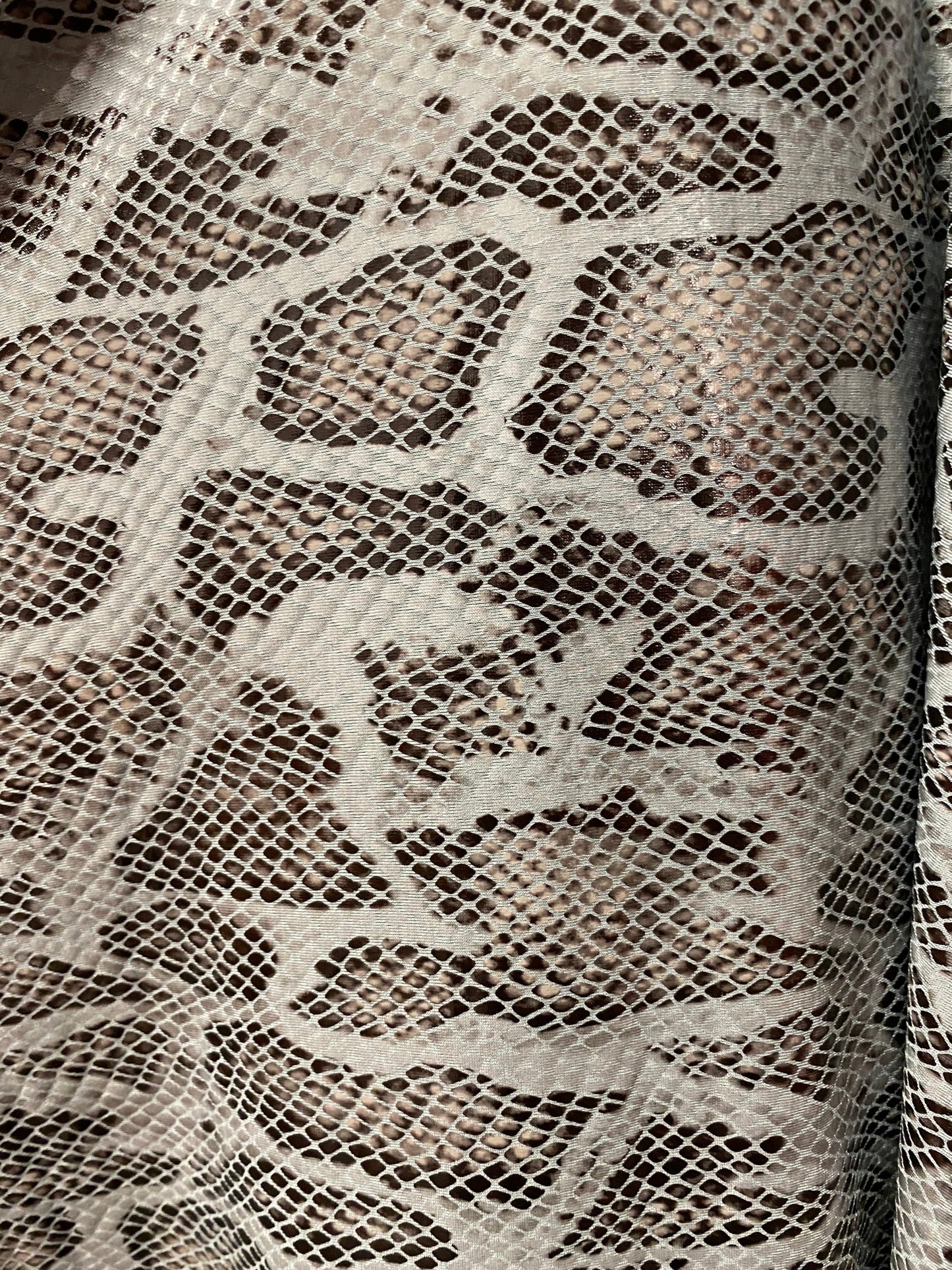 New Exotic snake design with clear foil print on poly spandex 2-way stretch Olive/Black/Taupe 58/60” Sold by the YD. Ships Worldwide