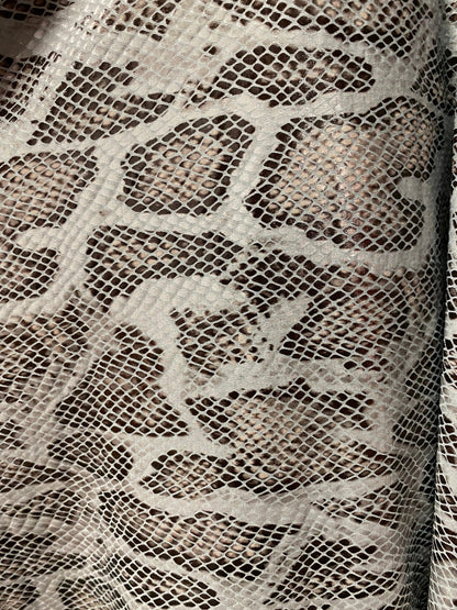 New Exotic snake design with clear foil print on poly spandex 2-way stretch Olive/Black/Taupe 58/60” Sold by the YD. Ships Worldwide