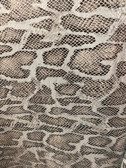 New Exotic snake design with clear foil print on poly spandex 2-way stretch Olive/Black/Taupe 58/60” Sold by the YD. Ships Worldwide
