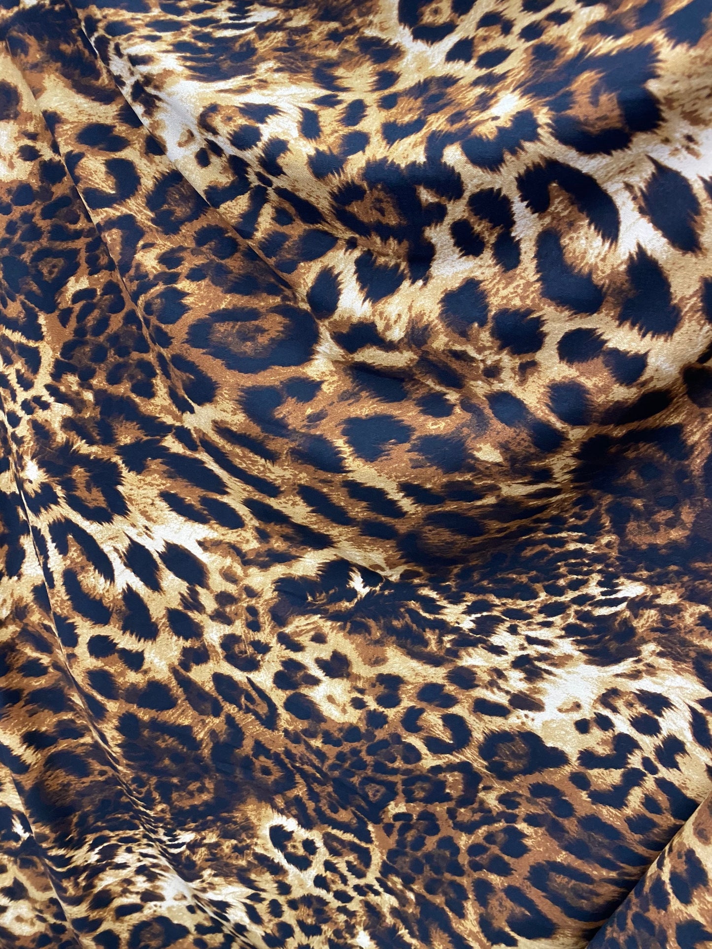 Exotic Leopard design print on great quality of poly spandex 4-way stretch 58/60” Sold by the YD. Ships Worldwide from Los Angeles californi