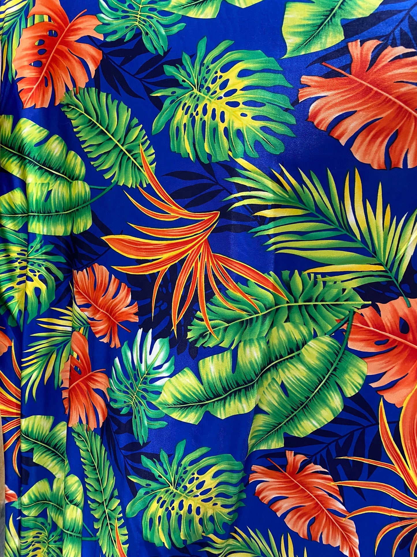 New Hawaiian design Sapphire multicolor print on poly spandex medium weight 4-way stretch 58/60” Sold by the YD. Ships Worldwide from L.A CA