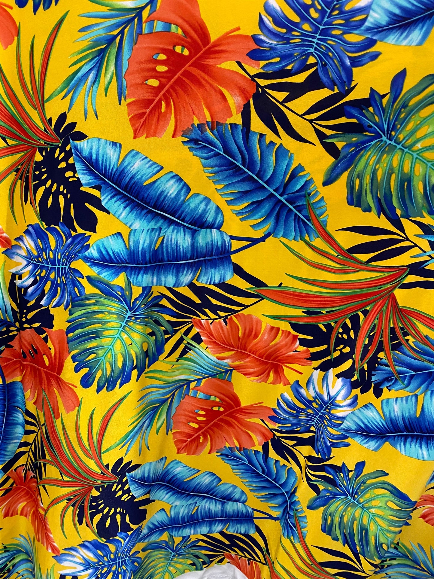 New Hawaiian design yellow/multicolor print on poly spandex medium weight 4-way stretch 58/60” Sold by the YD. Ships Worldwide from L.A CA