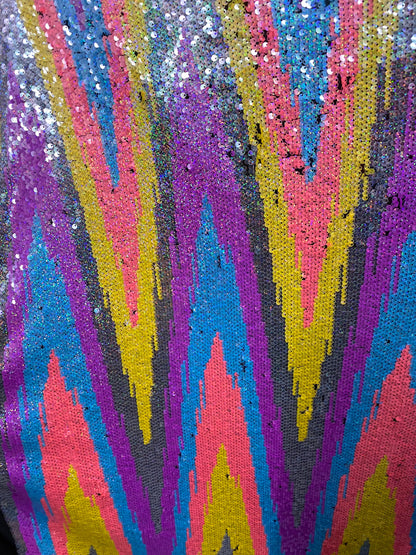 New chevron design multicolor rainbow sequins on stretch mesh 2-way 55/57” Sold by the YD. Ships worldwide from Los Angeles California USA.