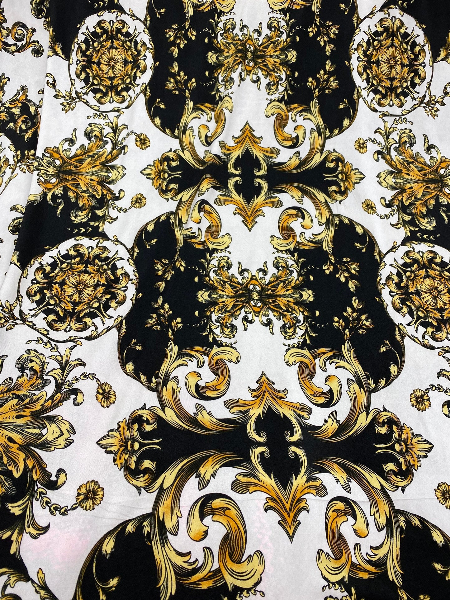 New Black/cold designer fabric print on poly spandex medium weight 4-way stretch 58/60” Sold by the YD. Ships Worldwide from Los Angeles CA.