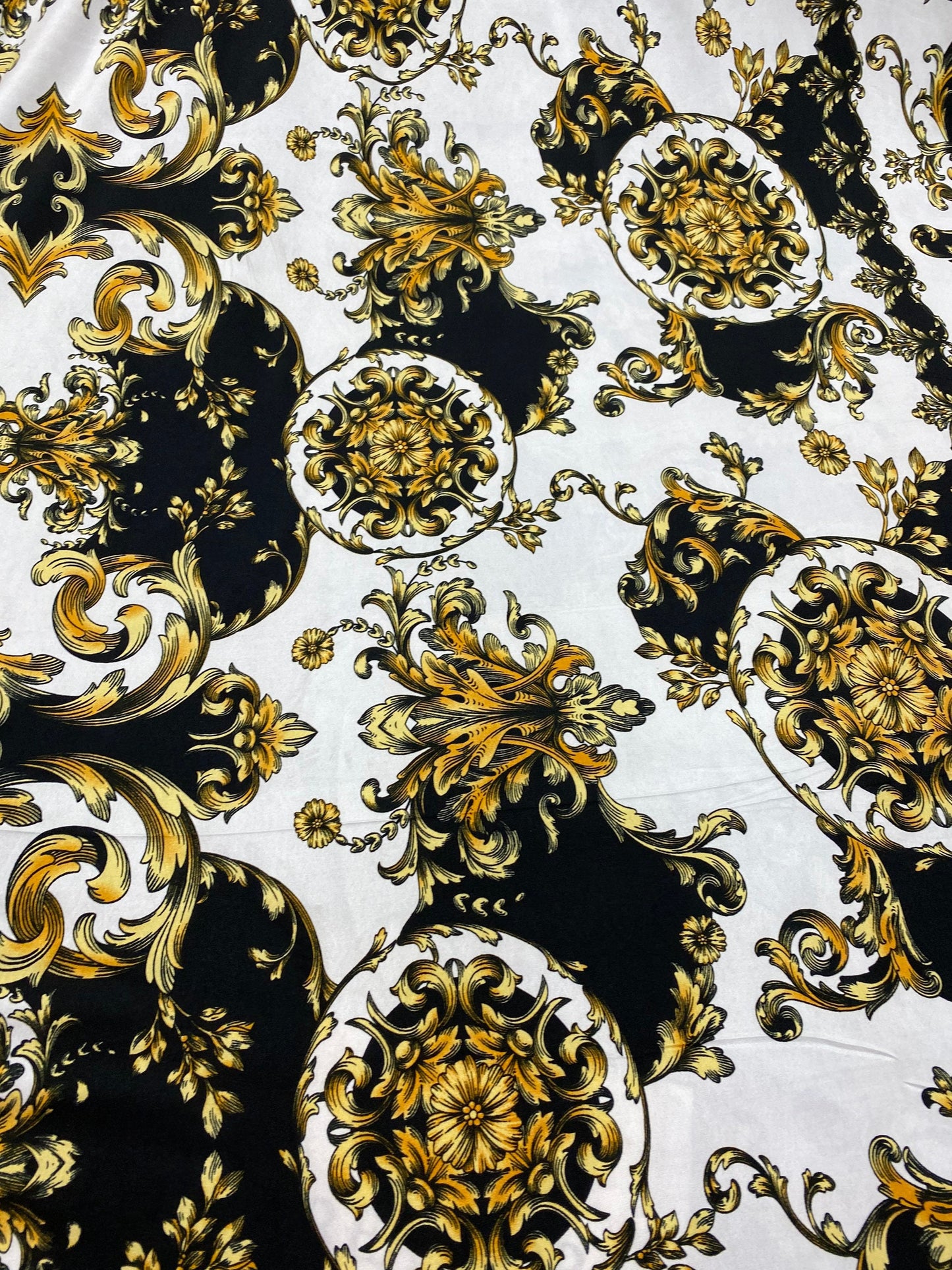 New Black/cold designer fabric print on poly spandex medium weight 4-way stretch 58/60” Sold by the YD. Ships Worldwide from Los Angeles CA.