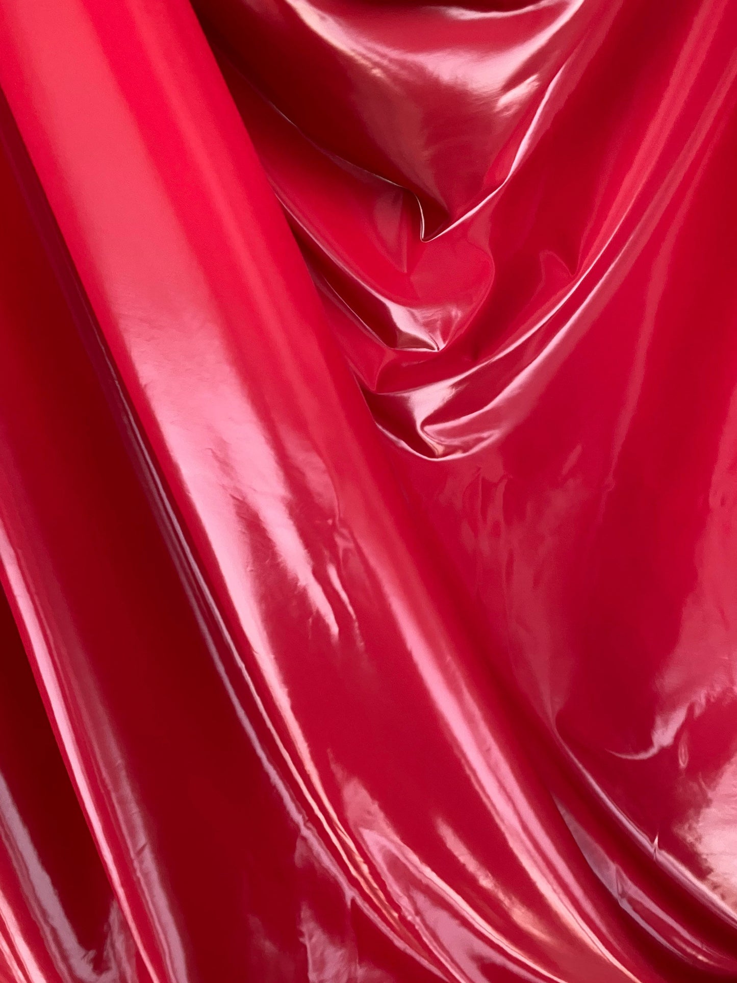 New super shiny stretch vinyl nylon spandex latex 4-way stretch 58/60” Sold by the YD. Ships Worldwide from Los Angeles California USA.