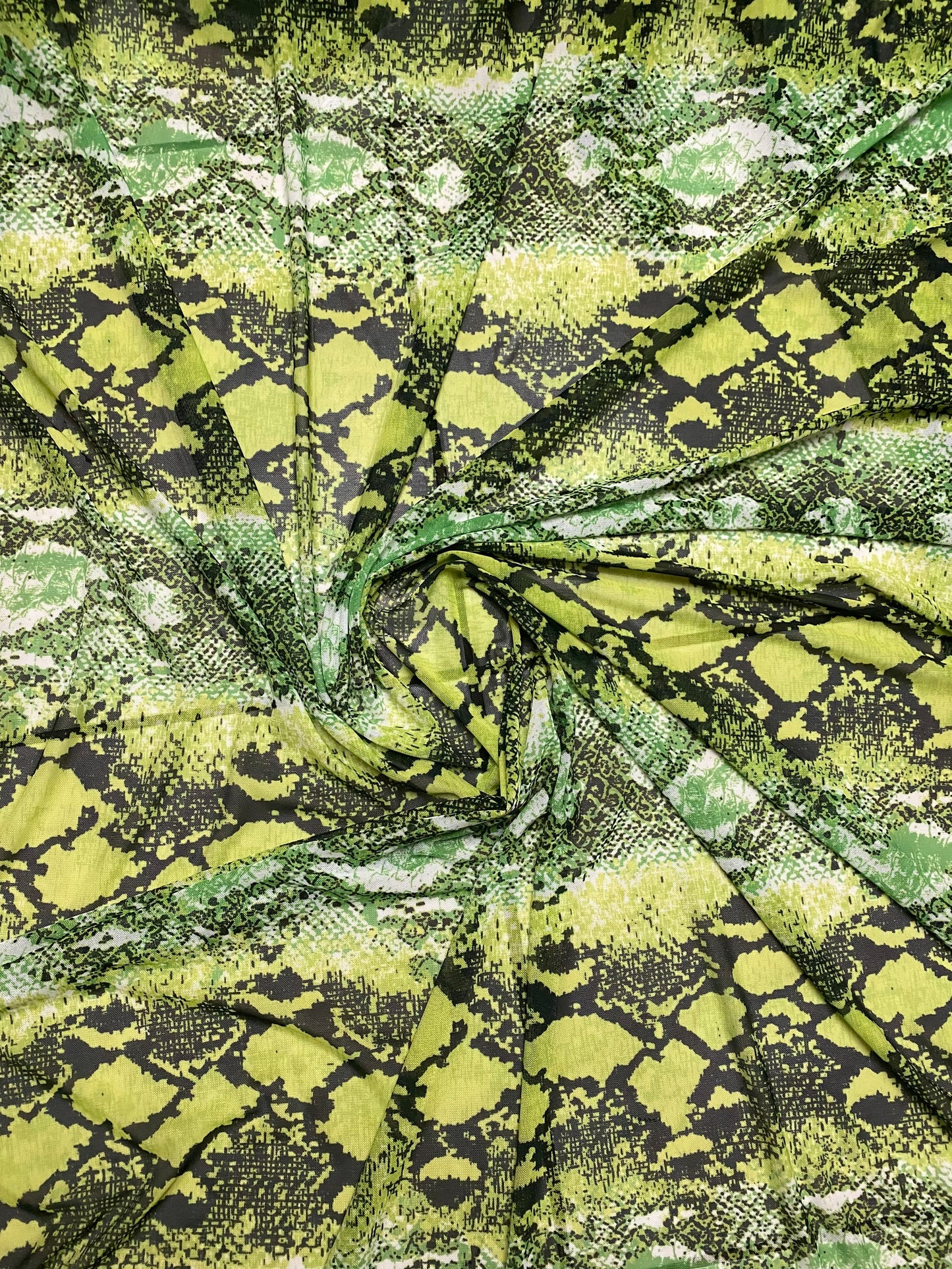 Anaconda design exotic snake print in great quality of nylon power mesh 4-way stretch 58/60” Sold by the YD. Ships Worldwide from L.A