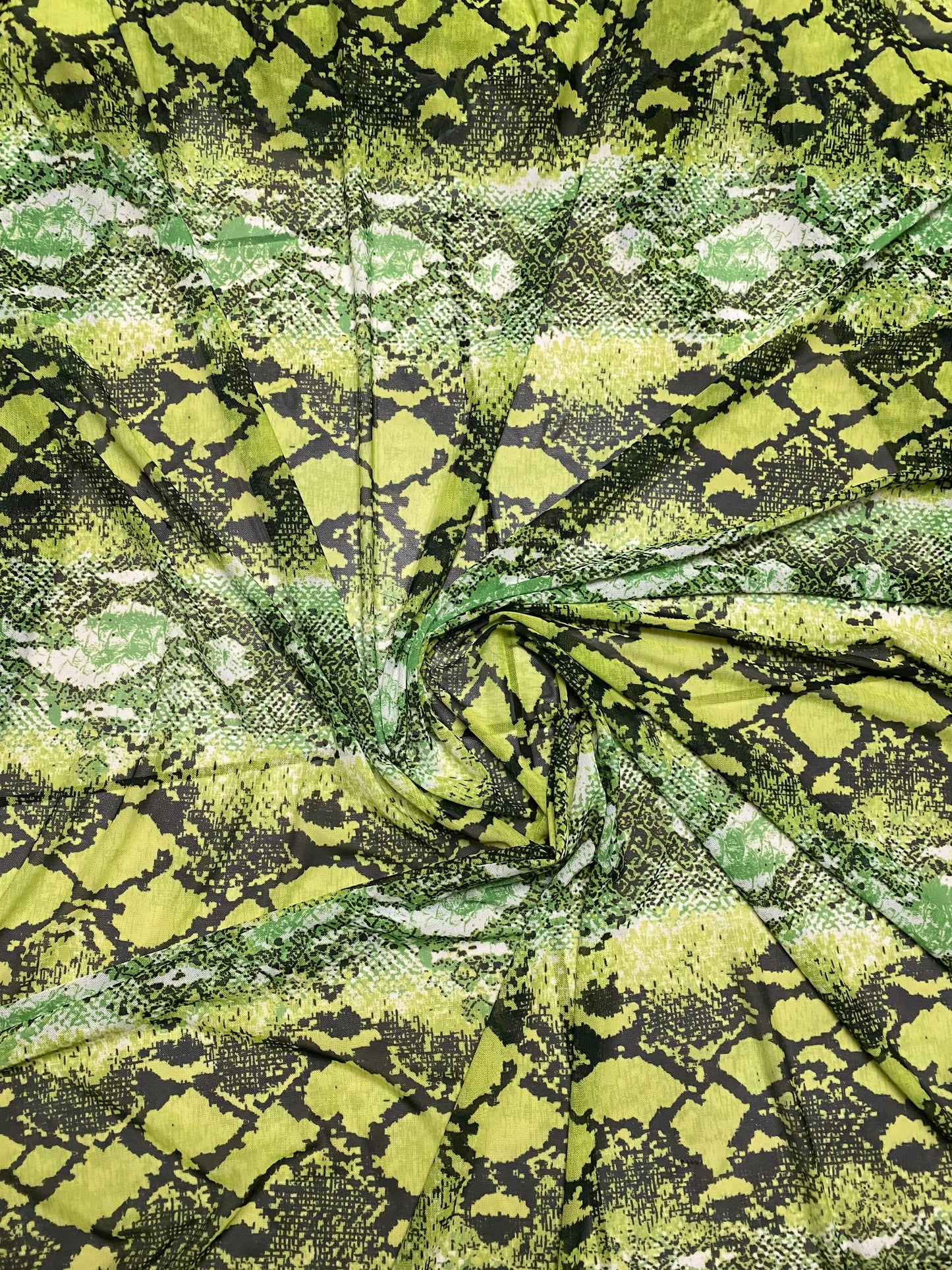Anaconda design exotic snake print in great quality of nylon power mesh 4-way stretch 58/60” Sold by the YD. Ships Worldwide from L.A