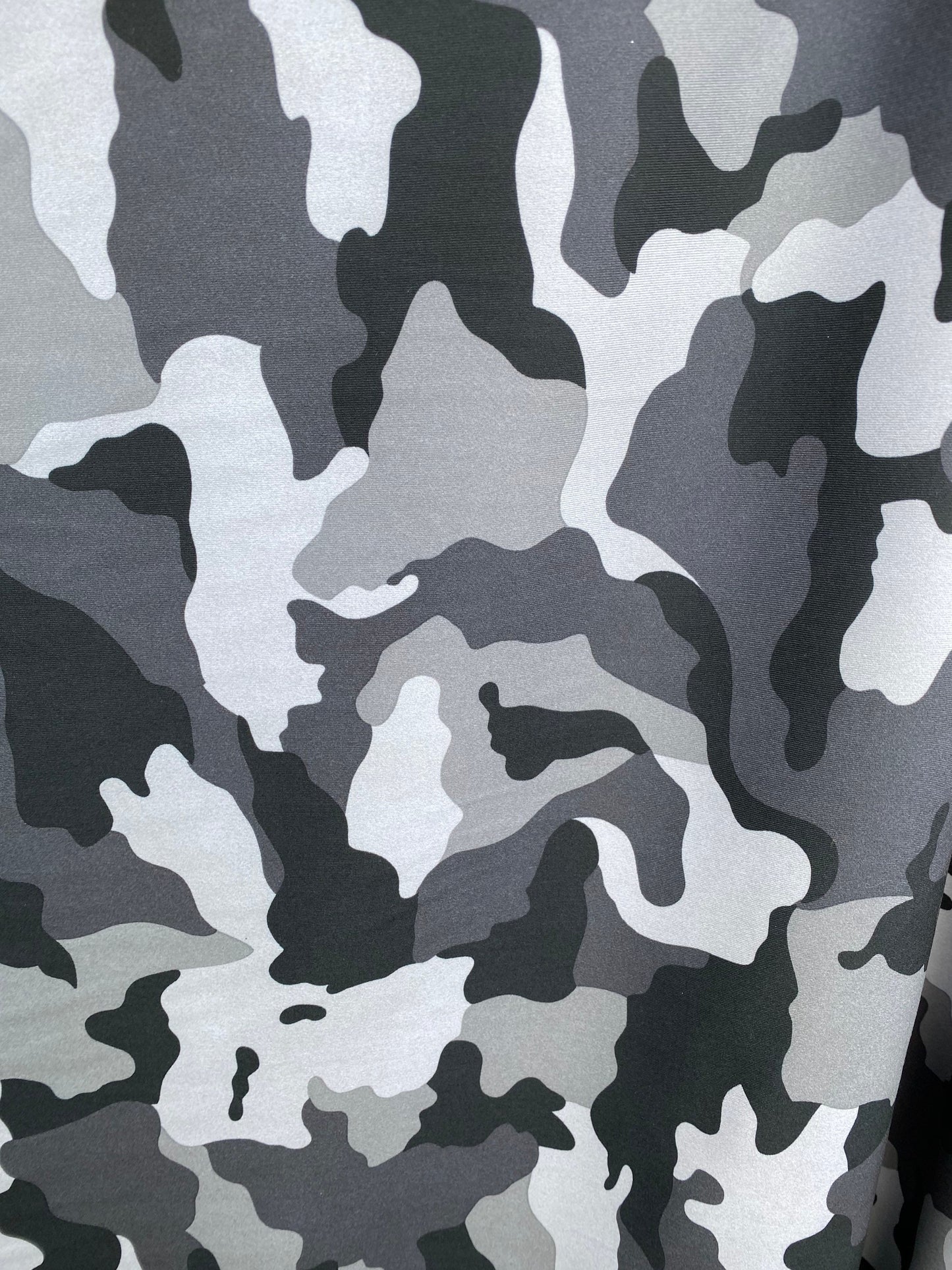 Camouflage design Gray/silver/black print on great quality of nylon spandex 4-way stretch 58/60” Sold by the YD. Ships Worldwide from L.A CA