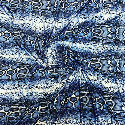 New snake skin sapphire/blue color print on poly spandex light weight 4-way stretch 58/60” Sold by the YD. Ships Worldwide from Los Angeles