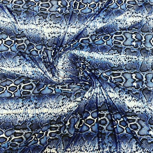 New snake skin sapphire/blue color print on poly spandex light weight 4-way stretch 58/60” Sold by the YD. Ships Worldwide from Los Angeles