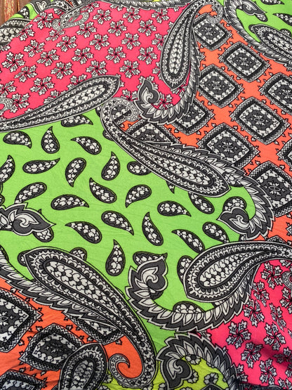 New paisley designs neon colors print on poly spandex jersey 4-way stretch medium weight 58/60” Sold by the YD. Ships Worldwide from L.A CA.