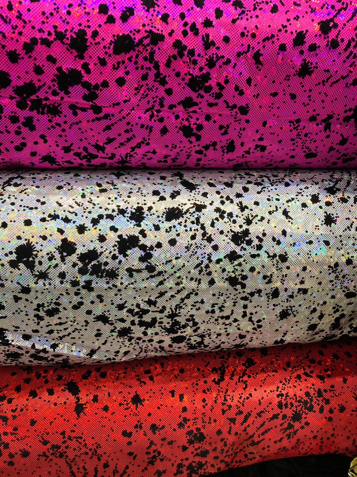 New splatter paint design print with flocking in hologram shattered glass metallic nylon spandex 4-way stretch 58/60” Sold by the YD.
