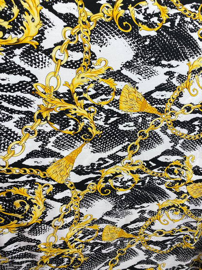 New brand design animal print with gold chains and tassels print on poly spandex 4-way stretch medium weight 58/60” Sold by the YD.