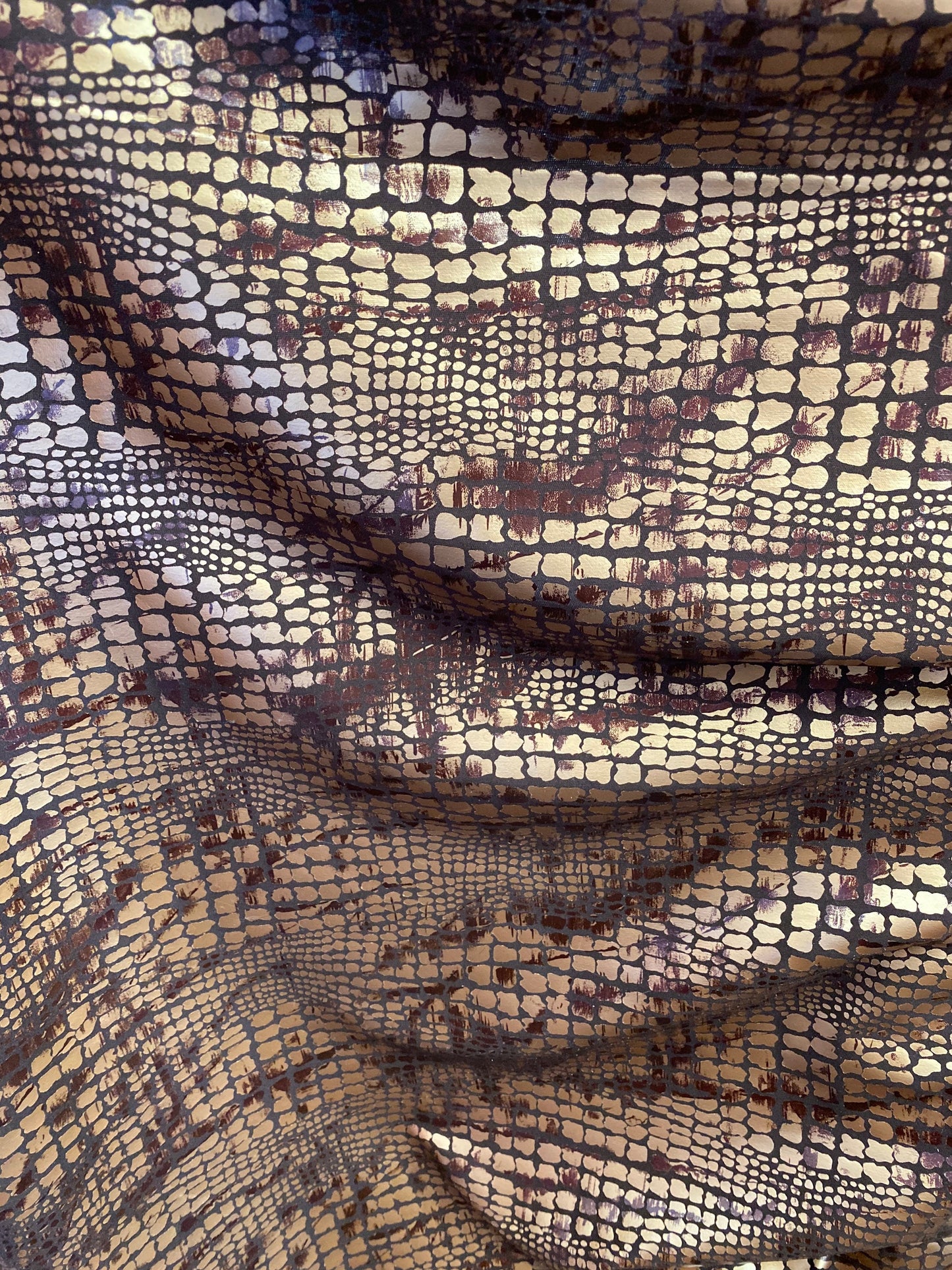 New Exotic animal print on metallic polyester non stretch 58/60” Sold by the YD. Ships Worldwide from Los Angeles California USA.