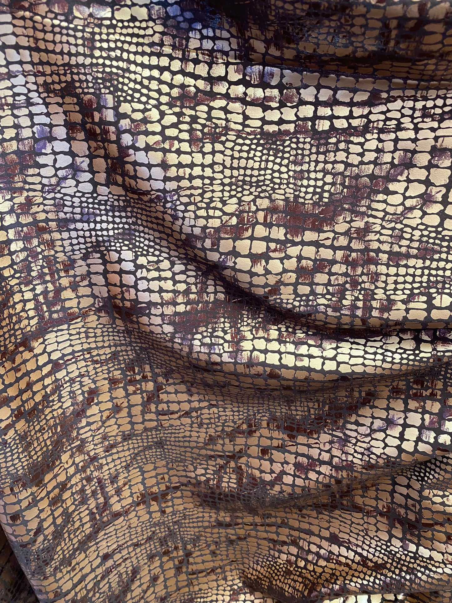 New Exotic animal print on metallic polyester non stretch 58/60” Sold by the YD. Ships Worldwide from Los Angeles California USA.