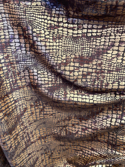 New Exotic animal print on metallic polyester non stretch 58/60” Sold by the YD. Ships Worldwide from Los Angeles California USA.
