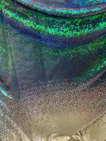 New Ombré design print on  iridescent mini cosmic sequins embroidered on stretch mesh 2-way 55/57” Sold by the YD. Ships Worldwide