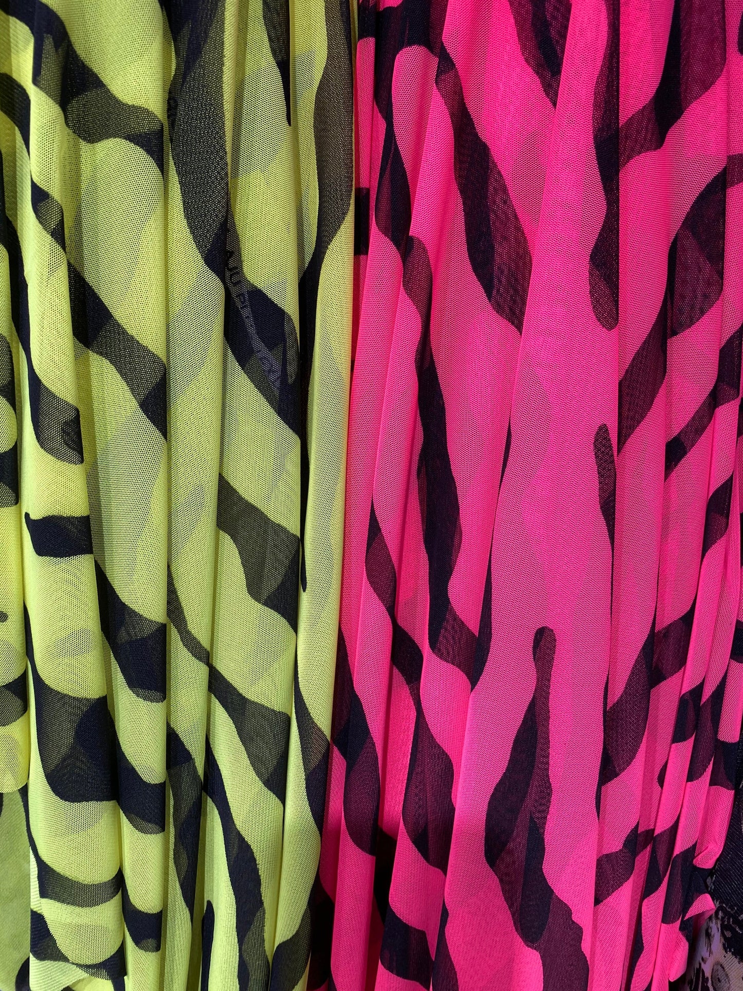 New Exotic zebra design neon colors print on great quality of power mesh 4-way stretch 58/60” Sold by the YD. Ships Worldwide from L.A CA.