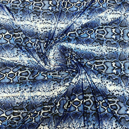 New snake skin sapphire/blue color print on poly spandex light weight 4-way stretch 58/60” Sold by the YD. Ships Worldwide from Los Angeles