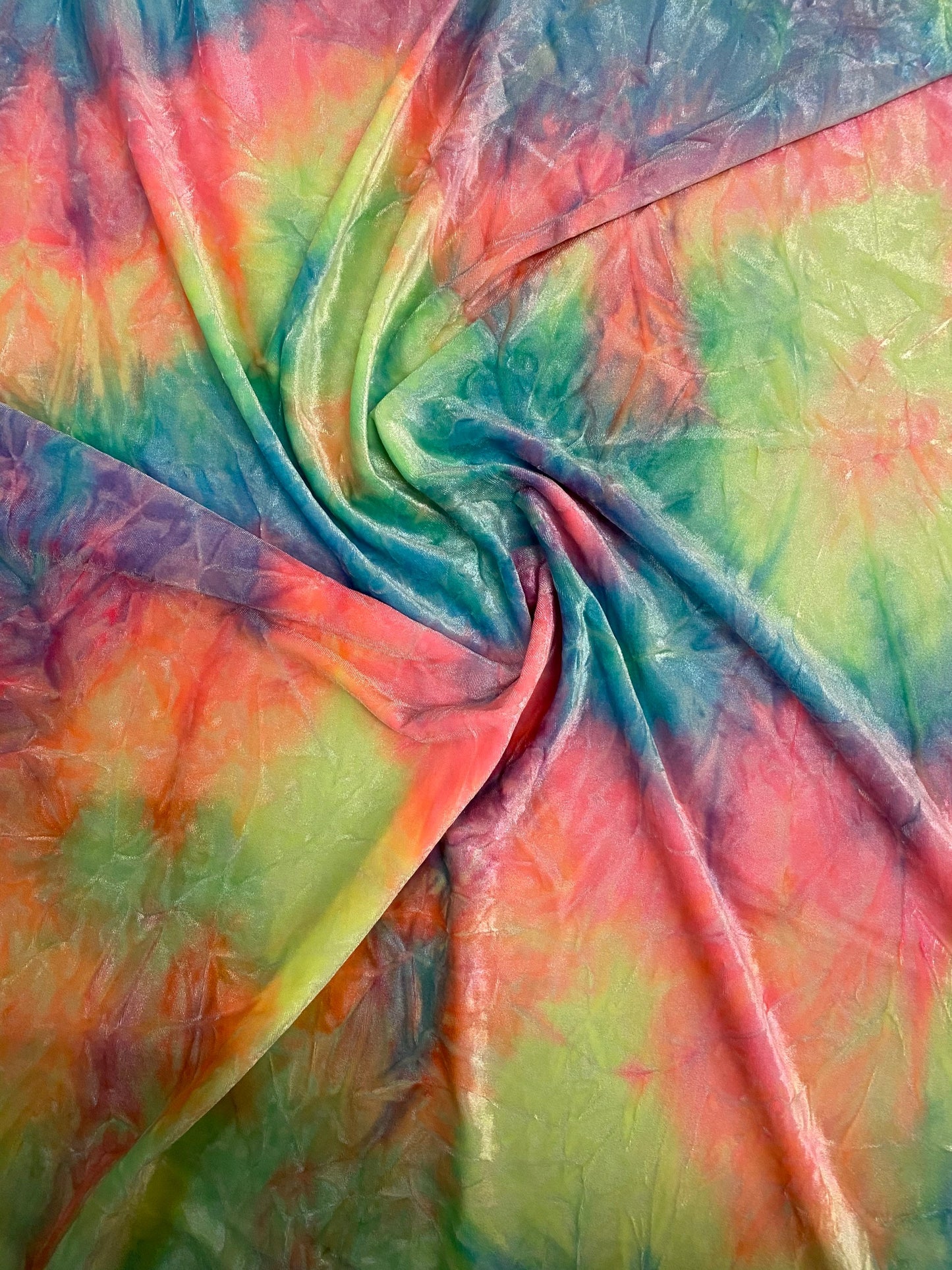 Rainbow multi pastel tie dye Luxury crushed velvet 4-way stretch 58-69” Sold by the YD. Ships Worldwide from Los Angeles California USA.