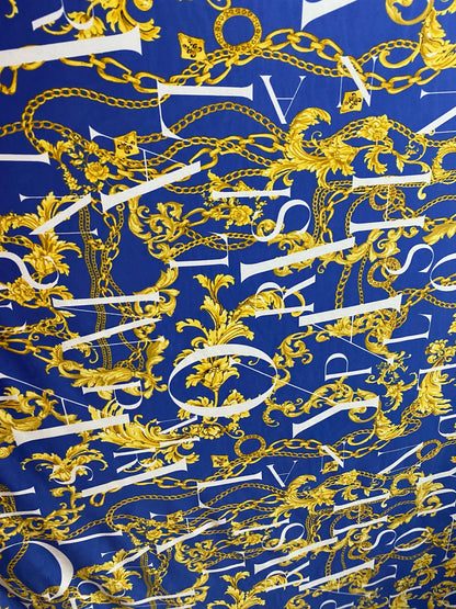 New brand design sapphire with gold chain print on poly spandex 4-way stretch 58/60” Sold by the YD. Ships worldwide from Los Angeles CA USA