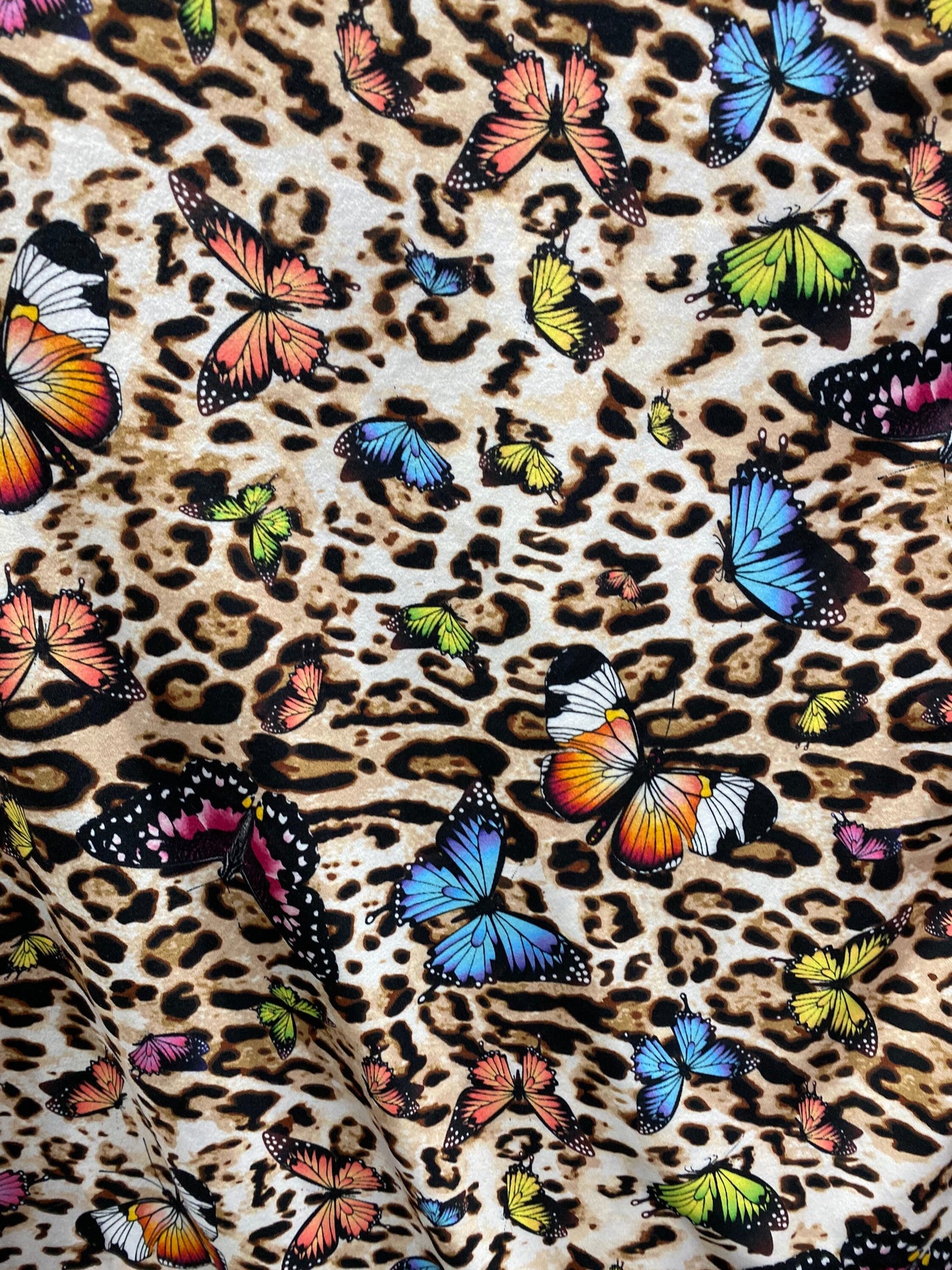 New butterfly design print on soft poly cotton spandex 4-way stretch 58/60” Sold by the YD. Ships Worldwide from Los Angeles California USA.