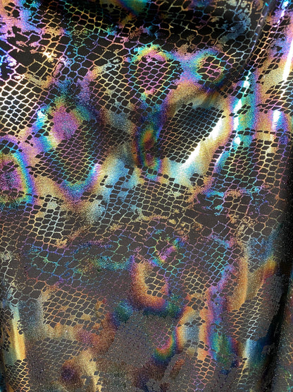 New Exotic cobra design Iridescent black hologram foil print on poly spandex 4-way stretch 58/60” Sold by the YD. Ships Worldwide from L.A