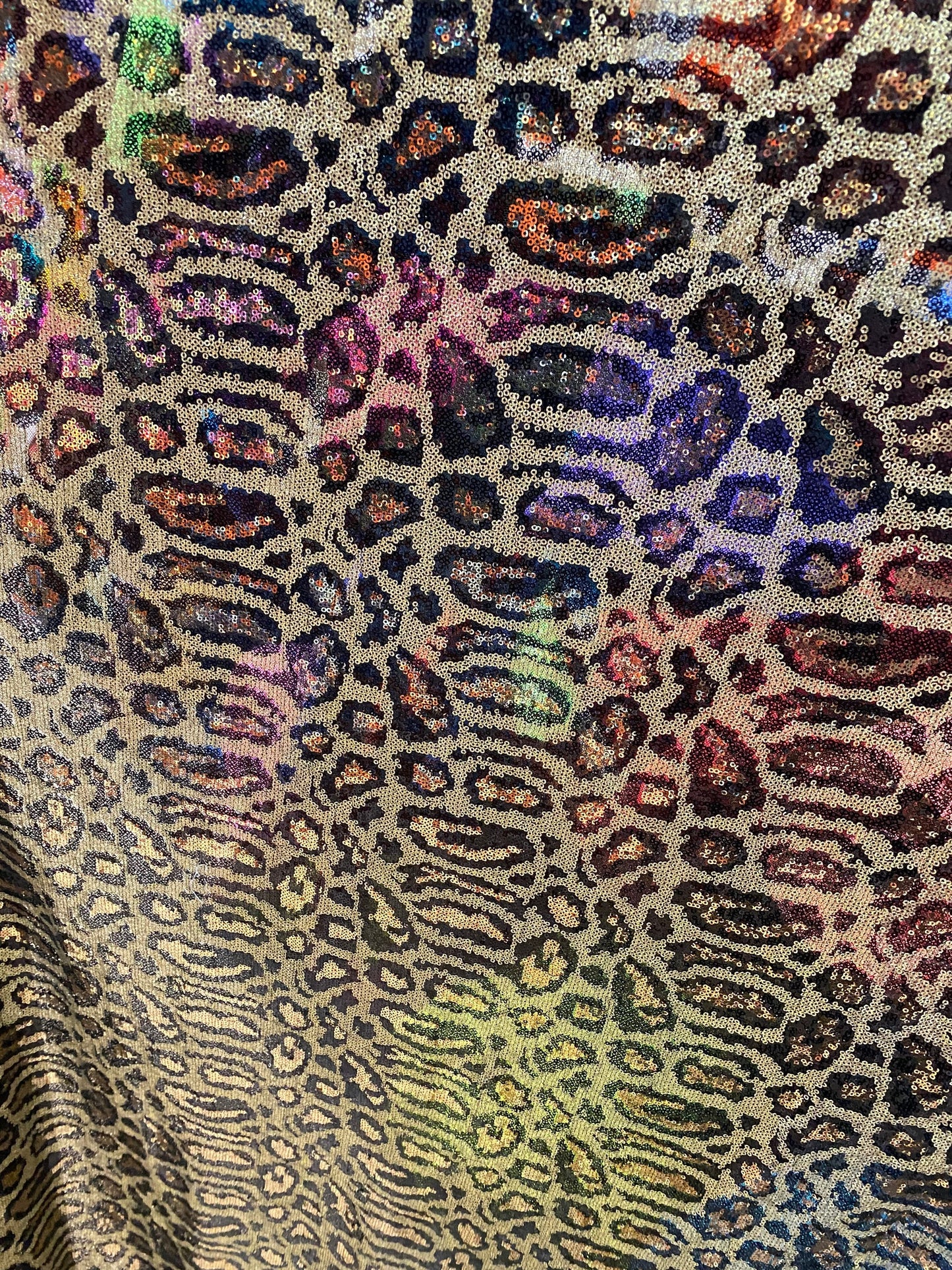 New Exotic leopard design print on mini glitz cosmic sequins embroidered on non-stretch mesh 58/60” Sold by the YD.