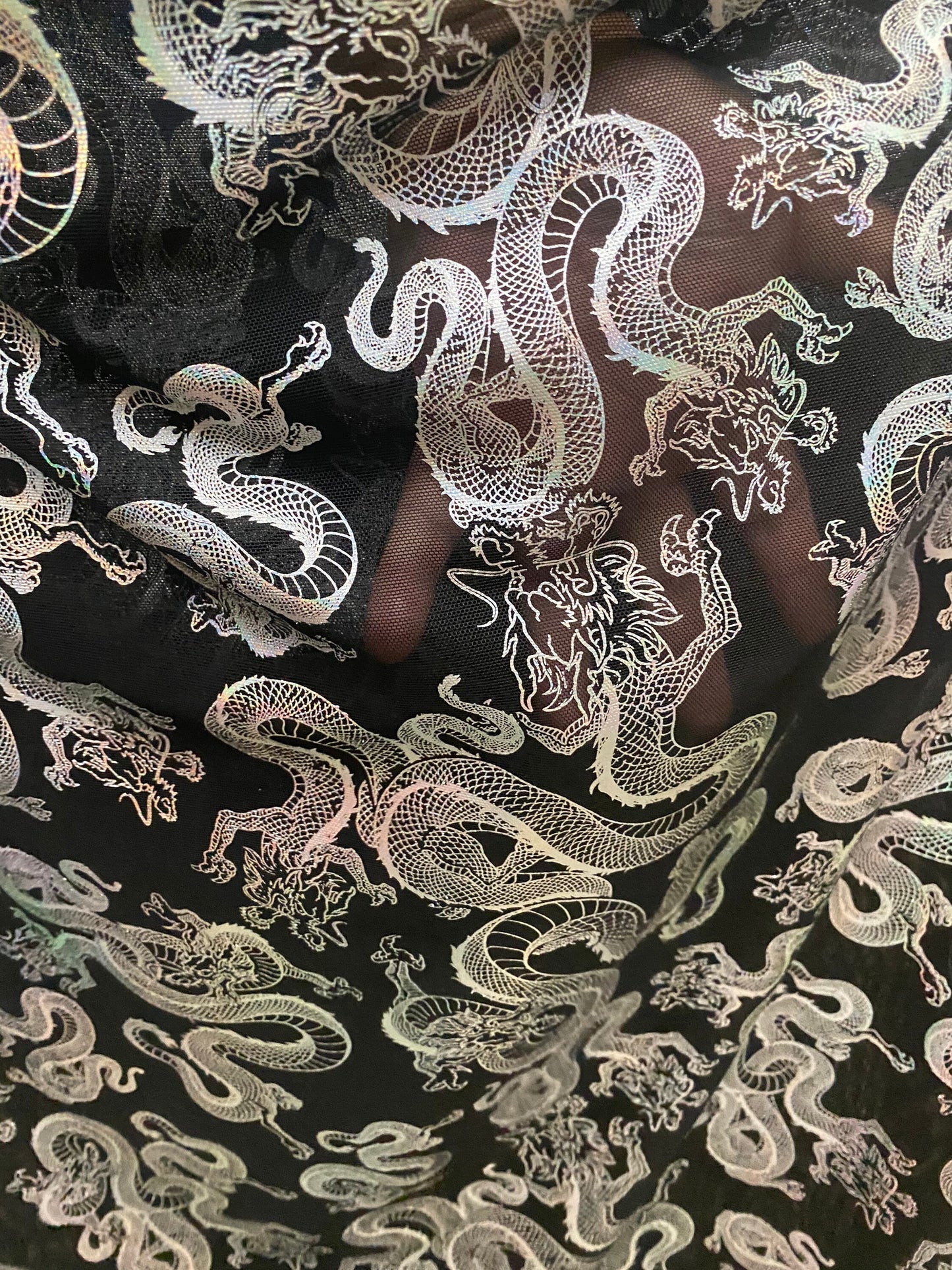 New Exotic Dragon design print on metallic power mesh nylon spandex 4-way stretch 58/60” Sold by the YD. Ships worldwide